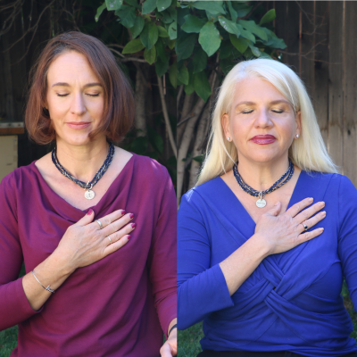 Liz and Cyrina Meditating - Hands Over Hearts